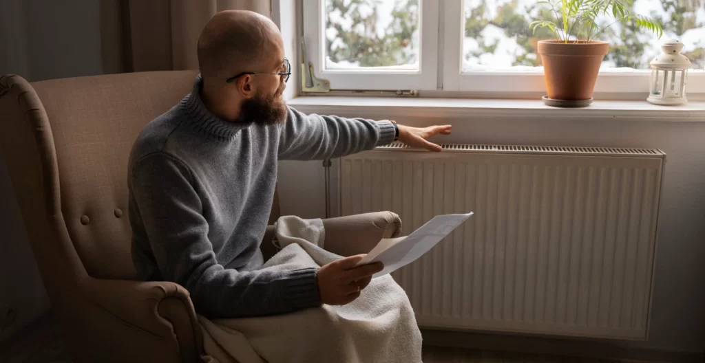 man looking bill energy crisis